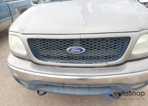 2002 Ford F-150 Lariat/Xlt z USA, uszkodzony, nr VIN 1FTRW08L12KC18122